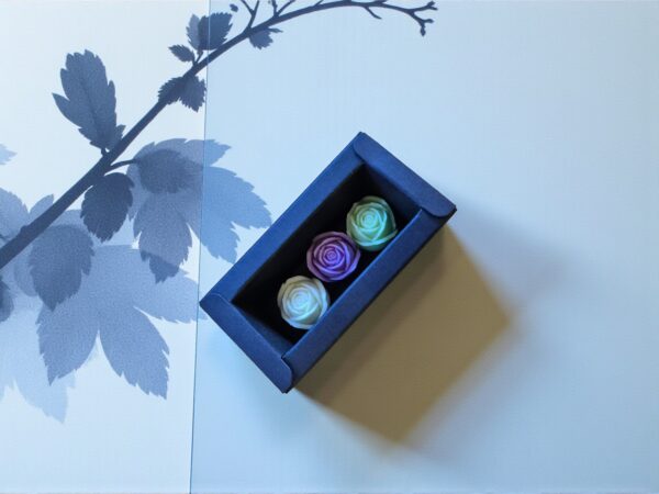 Miniature rose candles in a black gift box handmade from natural soy wax in Australia